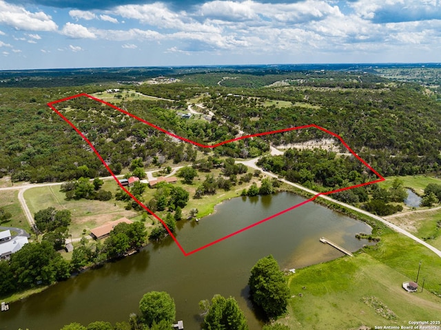 194 N Wood Duck, Kerrville, TX 78028 - aerial view of property and surrounding area featuring property boundaries highlighted and a nearby body of water