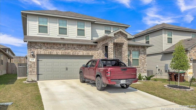 229 Colebrook Way, Cibolo, TX 78108 - view of front facade featuring driveway, a front lawn, an attached garage, and brick siding