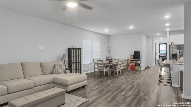 229 Colebrook Way, Cibolo, TX 78108 - living area featuring baseboards, wood finished floors, a ceiling fan, and recessed lighting