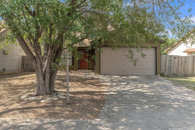 10222 Canton Fld, San Antonio, TX 78245 - view of front of house featuring driveway and a garage