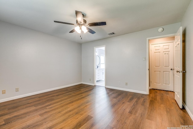 9331 Autumn Sunrise, San Antonio, TX 78254 - spare room with a ceiling fan, wood finished floors, and baseboards