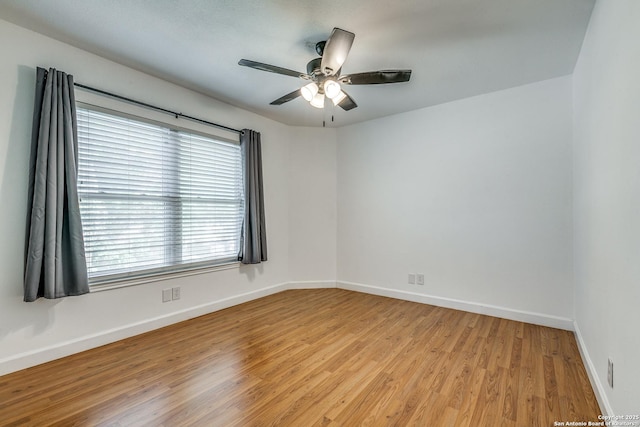 9331 Autumn Sunrise, San Antonio, TX 78254 - unfurnished room with light wood finished floors, baseboards, and ceiling fan