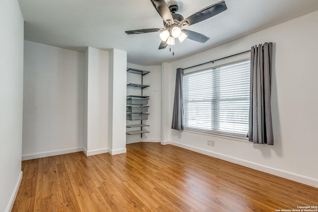 9331 Autumn Sunrise, San Antonio, TX 78254 - unfurnished bedroom with baseboards, light wood-type flooring, and a ceiling fan