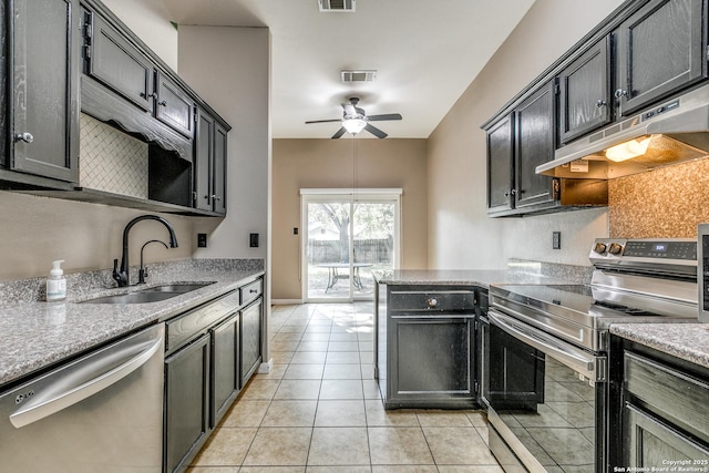 9331 Autumn Sunrise, San Antonio, TX 78254 - kitchen with stainless steel appliances, under cabinet range hood, a sink, ceiling fan, and light tile patterned floors