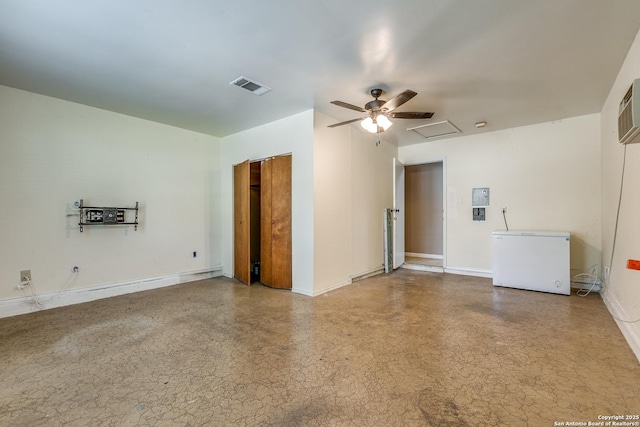 9331 Autumn Sunrise, San Antonio, TX 78254 - unfurnished living room featuring attic access, a ceiling fan, and baseboards