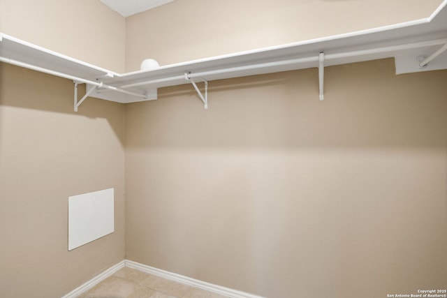1215 Dezarae St, San Antonio, TX 78253 - spacious closet featuring light tile patterned floors
