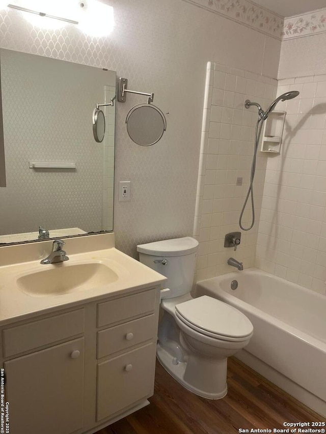 809 Marilyn, Schertz, TX 78154 - full bathroom with wood finished floors, toilet, vanity, and bathtub / shower combination