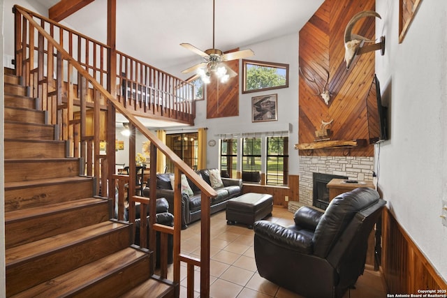 6641 Rr 1120 Unit A, B, Rio Frio, TX 78879 - living room featuring healthy amount of natural light, ceiling fan, high vaulted ceiling, wooden walls, and stairs