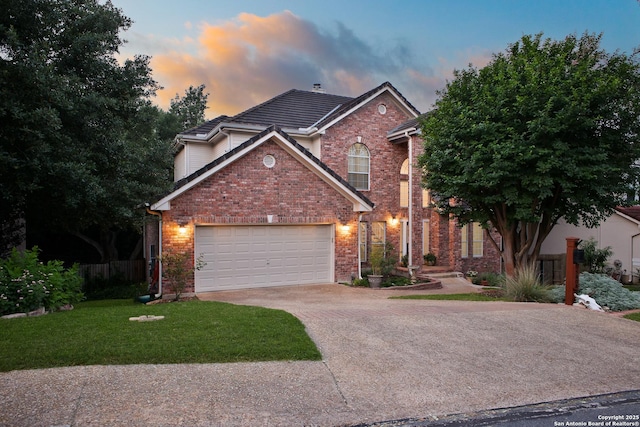 15808 Mission Rdg, San Antonio, TX 78232 - traditional home featuring concrete driveway, brick siding, an attached garage, and a tiled roof
