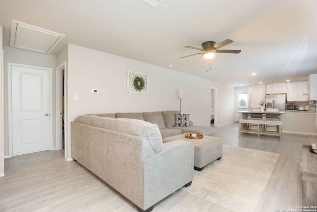 1206 Kiskadee Way, San Antonio, TX 78245 - living room featuring attic access, ceiling fan, light wood-style floors, recessed lighting, and baseboards