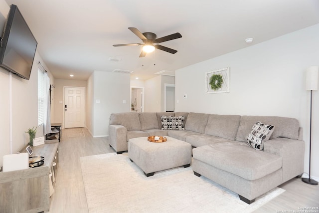 1206 Kiskadee Way, San Antonio, TX 78245 - living area with light wood finished floors, a ceiling fan, baseboards, and recessed lighting