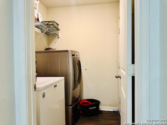 15134 Silver Tree, Von Ormy, TX 78073 - laundry room with washer and dryer, baseboards, and dark wood-type flooring
