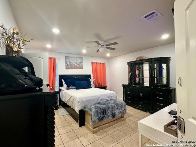 15134 Silver Tree, Von Ormy, TX 78073 - bedroom with recessed lighting, light tile patterned floors, and a ceiling fan