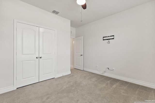 122 Braeburn, Boerne, TX 78015 - unfurnished bedroom with carpet flooring, baseboards, a closet, and a ceiling fan