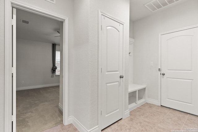 122 Braeburn, Boerne, TX 78015 - mudroom with baseboards, ceiling fan, and light colored carpet