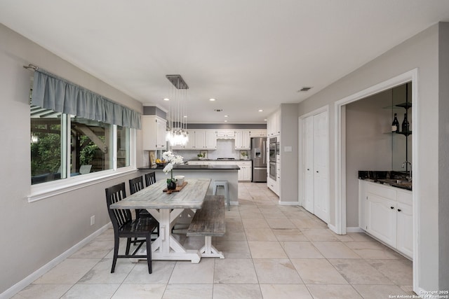 611 San Diego, San Antonio, TX 78232 - dining space with baseboards, recessed lighting, and light tile patterned floors