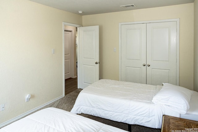 5922 Autumn Palms, San Antonio, TX 78242 - bedroom featuring carpet floors, a closet, and baseboards
