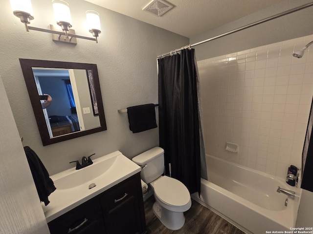 11002 Colt Chase, San Antonio, TX 78254 - full bathroom featuring wood finished floors, toilet, vanity, and shower / bath combination with curtain