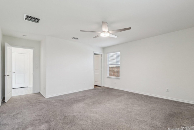 9321 Devils Riv, Converse, TX 78109 - spare room with a ceiling fan, carpet, and baseboards