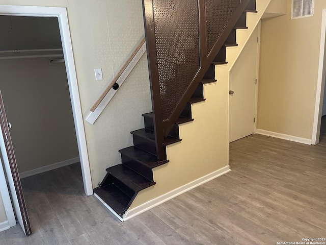 1538 Thorain, San Antonio, TX 78201 - stairs with wood finished floors and baseboards