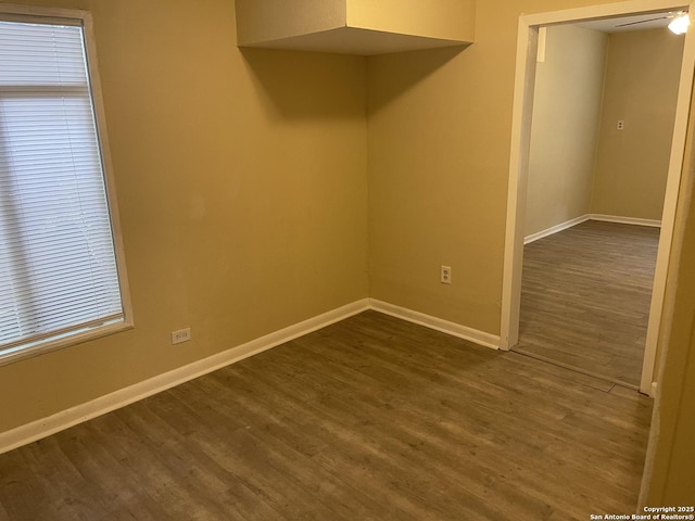1538 Thorain, San Antonio, TX 78201 - unfurnished room featuring baseboards and dark wood finished floors