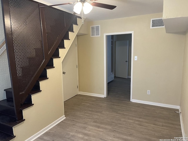 1538 Thorain, San Antonio, TX 78201 - stairway featuring wood finished floors, ceiling fan, and baseboards
