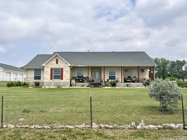 187 Tracks Trl, Center Point, TX 78010 - view of front of house with covered porch, stone siding, and a shingled roof