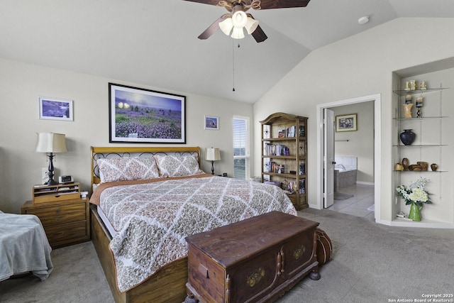 187 Tracks Trl, Center Point, TX 78010 - bedroom with lofted ceiling, carpet flooring, ceiling fan, baseboards, and connected bathroom