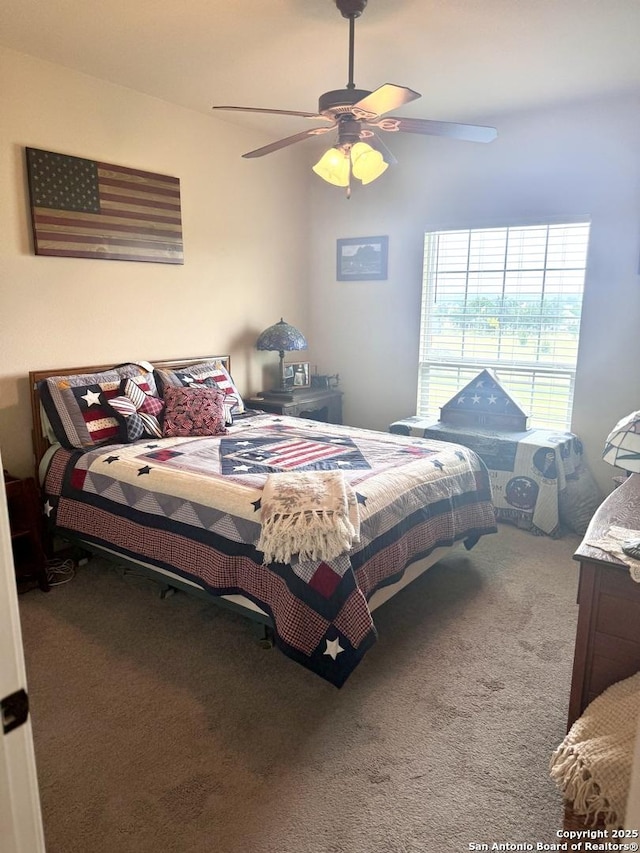187 Tracks Trl, Center Point, TX 78010 - carpeted bedroom with a ceiling fan
