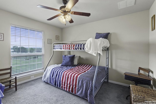 187 Tracks Trl, Center Point, TX 78010 - bedroom featuring carpet floors, baseboards, and a ceiling fan