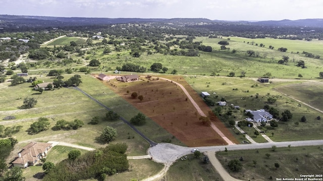 187 Tracks Trl, Center Point, TX 78010 - aerial view of property's location featuring rural landscape and a mountainous background