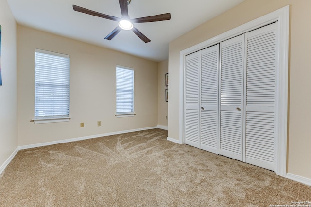 8537 Classic Oaks Ln, San Antonio, TX 78255 - unfurnished bedroom with carpet, a closet, baseboards, and ceiling fan