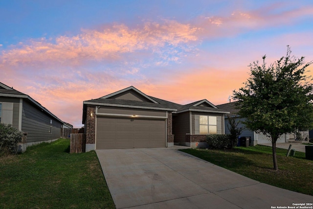 7718 Blue Gulf, San Antonio, TX 78222 - ranch-style house featuring brick siding, driveway, a front yard, and a garage