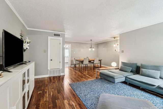2300 Nacogdoches Rd Unit 164R, San Antonio, TX 78209 - living room with wood finished floors, a textured ceiling, ornamental molding, and baseboards
