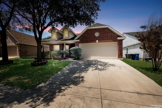 9911 Sable Arrow, San Antonio, TX 78251 - traditional home featuring brick siding, concrete driveway, an attached garage, a front lawn, and central AC unit
