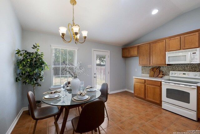 9911 Sable Arrow, San Antonio, TX 78251 - kitchen featuring white appliances, brown cabinets, a chandelier, tasteful backsplash, and lofted ceiling