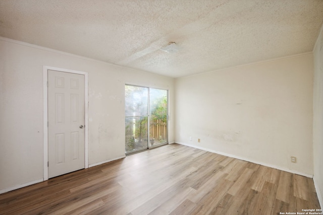 1324 Longmont, San Antonio, TX 78245 - empty room with wood finished floors, a textured ceiling, and crown molding
