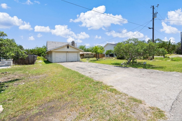 771 Mockingbird, Spring Branch, TX 78070 - view of front of home with a garage and a chimney