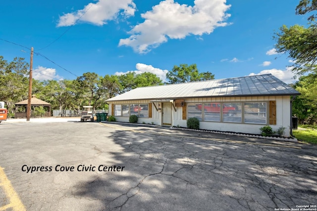 771 Mockingbird, Spring Branch, TX 78070 - view of front of house featuring a standing seam roof, metal roof, and a gazebo