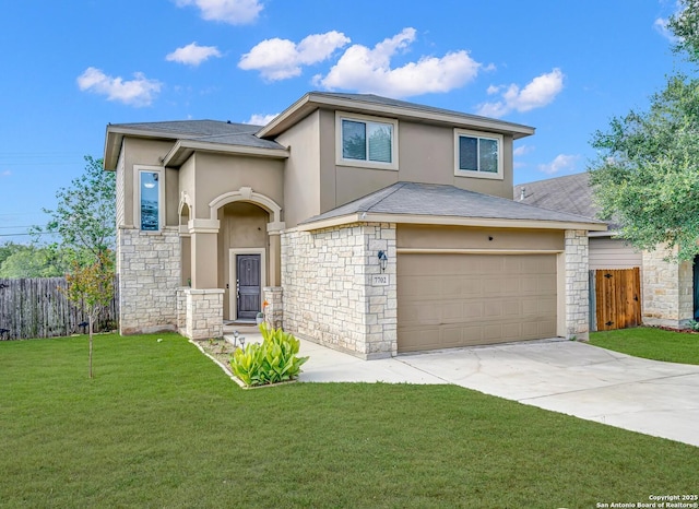 7702 Bit Cir, Elmendorf, TX 78112 - view of front of home with stone siding, driveway, stucco siding, and a garage
