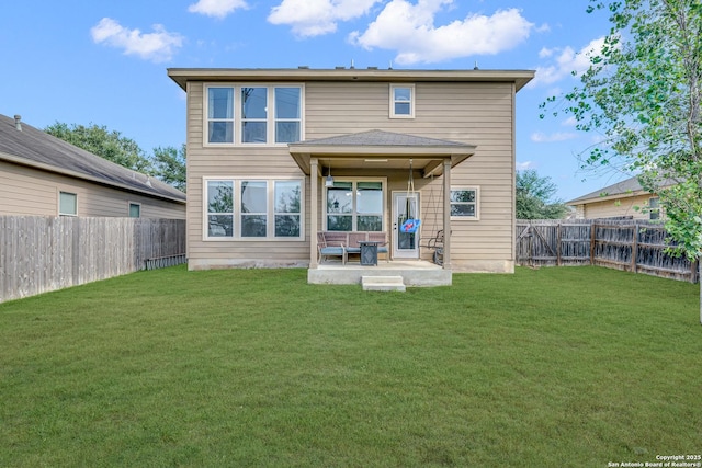 7702 Bit Cir, Elmendorf, TX 78112 - back of property featuring a patio