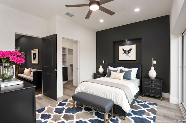 130 E Lachapelle, San Antonio, TX 78204 - bedroom with light wood-type flooring, baseboards, recessed lighting, and a ceiling fan