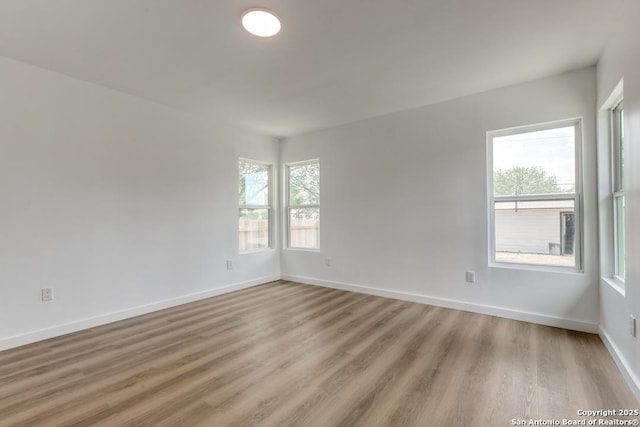 602 John Page, San Antonio, TX 78228 - spare room with light wood-style floors and baseboards