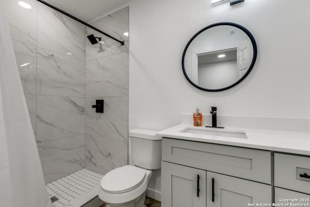 602 John Page, San Antonio, TX 78228 - full bath with vanity, toilet, and a marble finish shower
