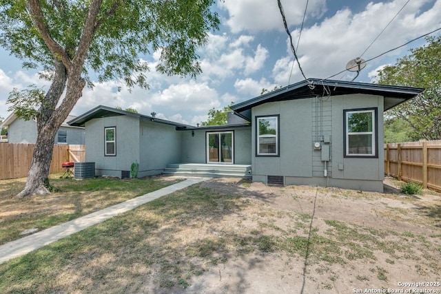 602 John Page, San Antonio, TX 78228 - back of house featuring crawl space, cooling unit, and stucco siding