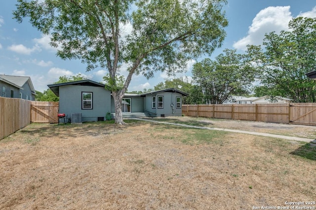 602 John Page, San Antonio, TX 78228 - rear view of house with central AC unit