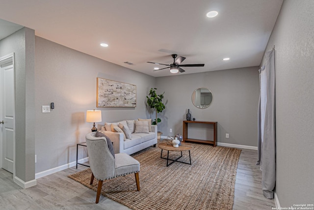 4935 Bartmer Ave, San Antonio, TX 78228 - living room featuring light wood-style floors, a ceiling fan, and recessed lighting