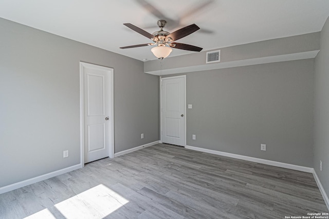 4935 Bartmer Ave, San Antonio, TX 78228 - empty room with wood finished floors and a ceiling fan