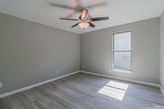 4935 Bartmer Ave, San Antonio, TX 78228 - empty room with a ceiling fan and wood finished floors