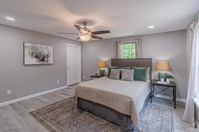 4935 Bartmer Ave, San Antonio, TX 78228 - bedroom with light wood-type flooring, ceiling fan, and recessed lighting